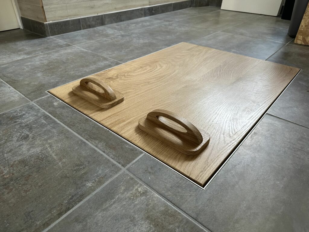 Fabrication d'une trappe de sol isolé avec poignée aimantée